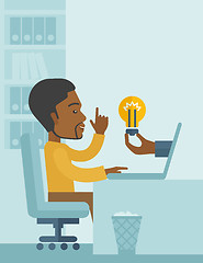 Image showing Black guy working inside his office.