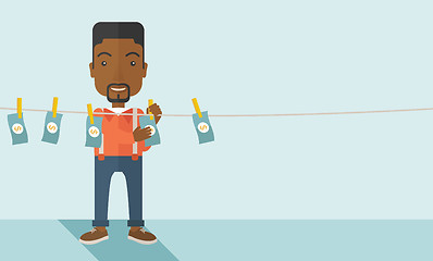 Image showing Black buisnessman hang his money.