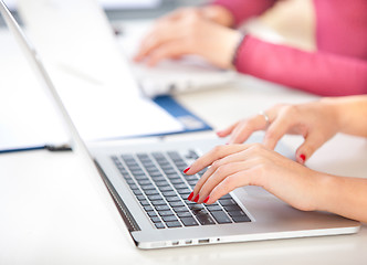 Image showing woman typing on laptop