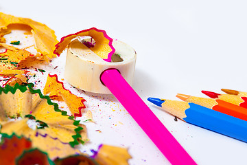 Image showing colored pencils, sharpener and shavings