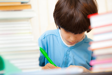 Image showing schoolboy doing homework