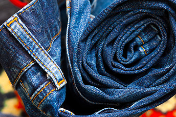 Image showing jeans constricted into a roll
