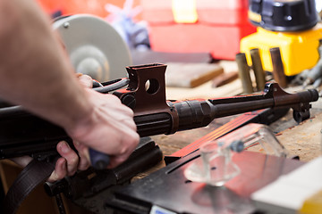 Image showing repair of the old German submachine gun MP-38