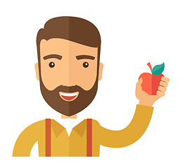 Image showing Happy man holding a red apple.