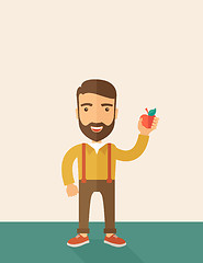 Image showing Happy man holding a red apple.