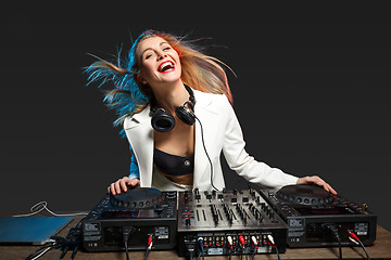 Image showing Beautiful blonde DJ girl on decks - the party,