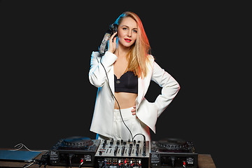 Image showing Beautiful blonde DJ girl on decks - the party,