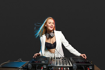 Image showing Beautiful blonde DJ girl on decks - the party,