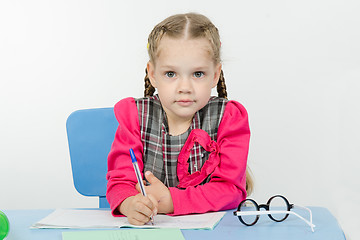 Image showing First grader do homework