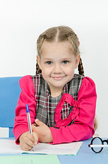 Image showing Schoolgirl do homework