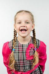 Image showing Half-length portrait of a smiling girl four years