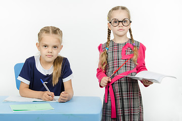 Image showing Children playing in the teacher and student