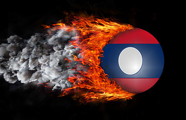 Image showing Flag with a trail of fire and smoke - Laos