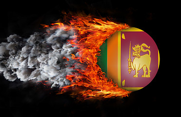 Image showing Flag with a trail of fire and smoke - Sri Lanka