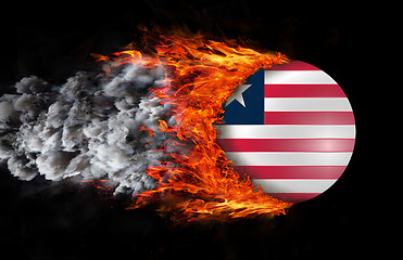 Image showing Flag with a trail of fire and smoke - Liberia