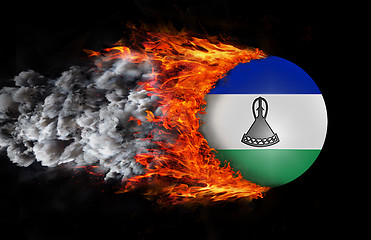 Image showing Flag with a trail of fire and smoke - Lesotho