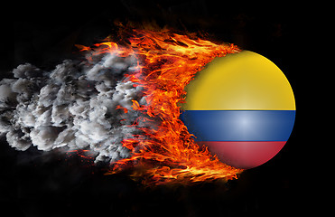 Image showing Flag with a trail of fire and smoke - Colombia