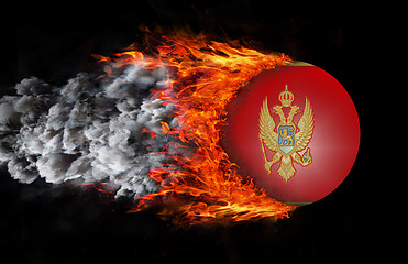 Image showing Flag with a trail of fire and smoke - Montenegro