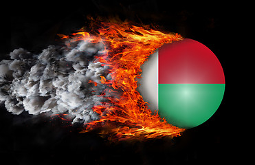 Image showing Flag with a trail of fire and smoke - Madagascar