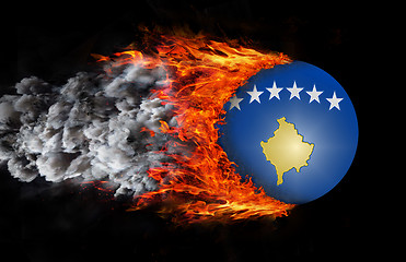 Image showing Flag with a trail of fire and smoke - Kosovo