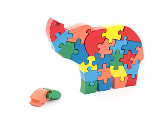 Image showing Colorful puzzle pieces in elephant shape