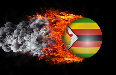 Image showing Flag with a trail of fire and smoke - Zimbabwe