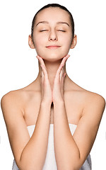 Image showing Portrait of beautiful girl stroking her face with healthy skin 