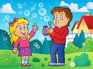 Image showing Children playing with bubble kit theme 2