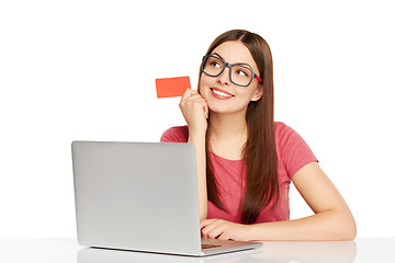 Image showing smiling businesswoman with laptop and credit card