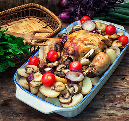 Image showing delicious chicken baked potato and fresh vegetables