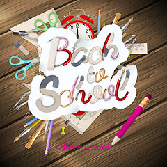 Image showing School supplies on wooden background. EPS 10