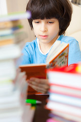 Image showing boy reading a book