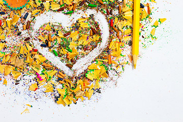 Image showing heart, yellow pencil and wooden chips