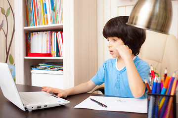 Image showing child doing homework