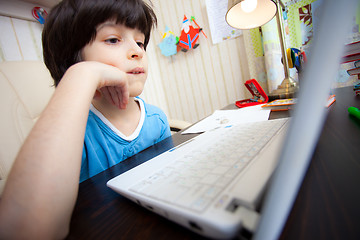 Image showing distance learning, a child with computer