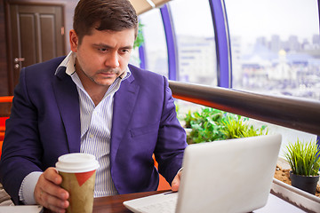 Image showing businesswoman working on a computer