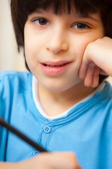Image showing boy portrait with pen