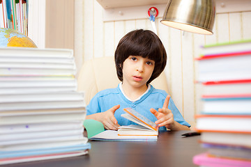 Image showing child reading a book