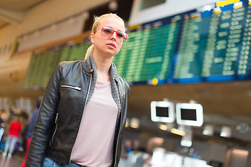 Image showing Female traveller walking airport terminal.