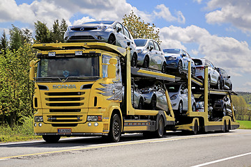 Image showing Yellow Scania R500 Car Carrier Hauls New Cars