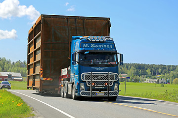 Image showing Volvo FH Hauls Wide Load along Highway