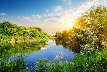 Image showing Yellow sunset over river