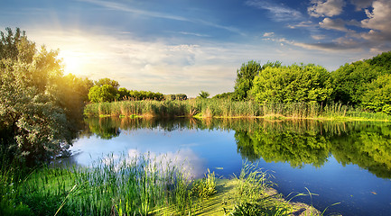 Image showing Evening sun over river