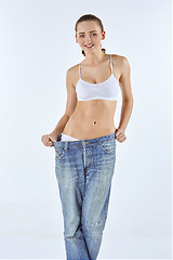 Image showing Woman became skinny and wearing old jeans