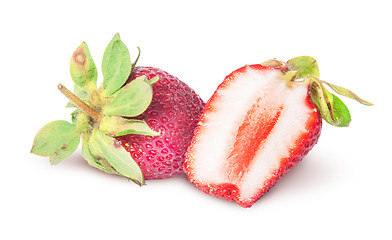 Image showing One whole and half juicy strawberries