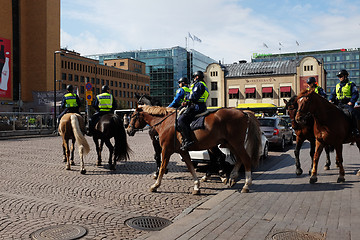 Image showing HELSINKI, FINLAND – MAY 21, 2015: Mounted police patrol in the