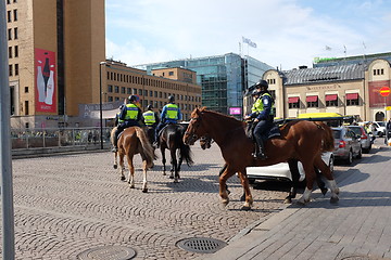 Image showing HELSINKI, FINLAND – MAY 21, 2015: Mounted police patrol in the