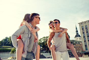 Image showing smiling couple having fun in city