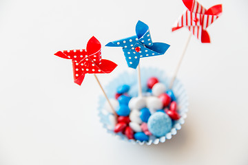 Image showing candies with pinwheel toys on independence day