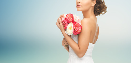 Image showing bride or woman with bouquet of flowers